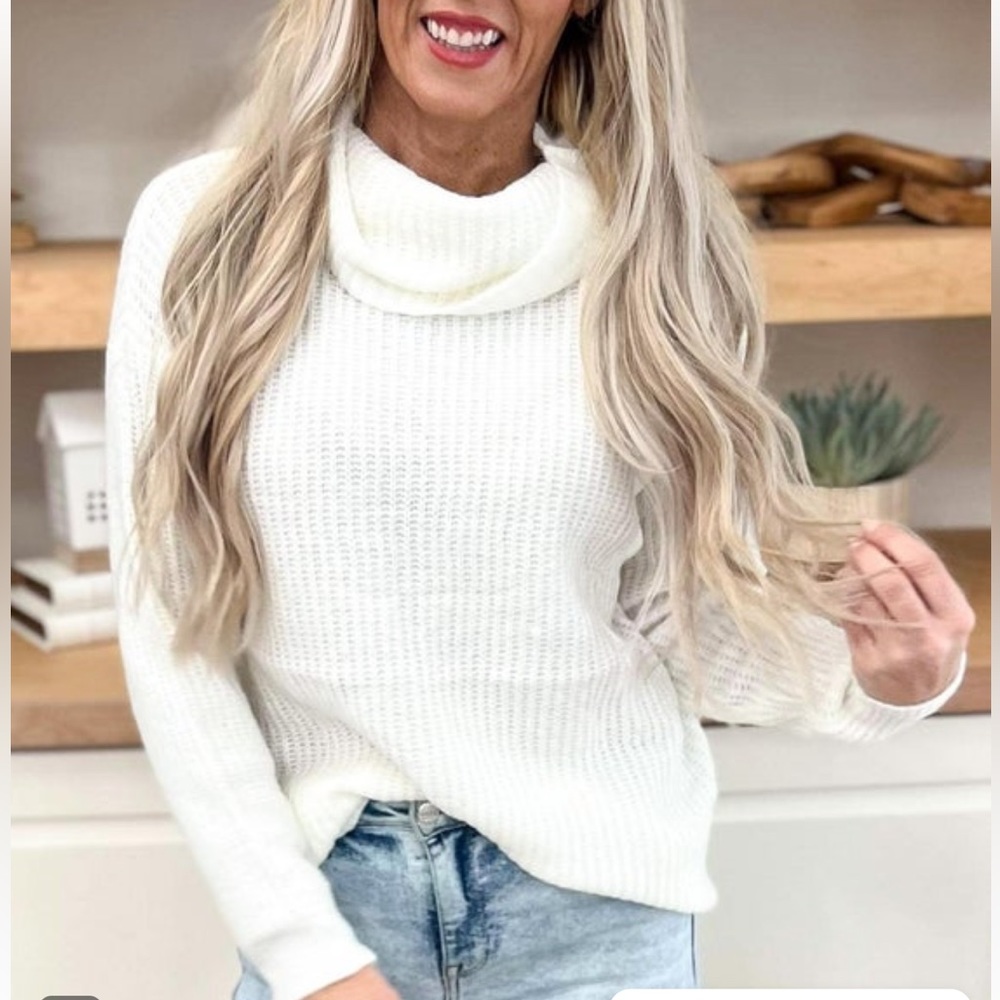 Brand new ivory cutout turtleneck sweater